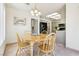 A cozy dining area features a wooden table, chairs, and is adjacent to the kitchen at 3013 Sungold Dr, Las Vegas, NV 89134