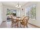 Bright dining area with sliding glass doors that lead to the backyard at 3013 Sungold Dr, Las Vegas, NV 89134