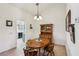 Cozy dining room with classic wooden furniture and ample natural light at 3013 Sungold Dr, Las Vegas, NV 89134