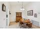 Cozy dining room with classic wooden furniture and ample natural light at 3013 Sungold Dr, Las Vegas, NV 89134