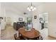 Open concept living room flows into the dining area and kitchen with updated appliances at 3013 Sungold Dr, Las Vegas, NV 89134