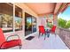 Covered patio featuring tiled floors and outdoor seating area at 3013 Sungold Dr, Las Vegas, NV 89134