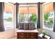 The window seat provides natural lighting and backyard views through the large bay window at 3013 Sungold Dr, Las Vegas, NV 89134