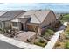 Elevated view of desert-landscaped single-story home with paver driveway at 3096 Beaux Art Ave, Henderson, NV 89044