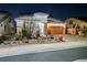 Charming single-story home with desert landscaping, stone accents, and a two-car garage at 3096 Beaux Art Ave, Henderson, NV 89044
