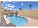 Inviting pool and spa area, perfect for relaxing and unwinding in a private backyard setting with desert landscaping at 344 Golden Shore Dr, Las Vegas, NV 89123