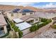 Birds eye view of a house featuring solar panels, outdoor kitchen and cozy backyard in a residential community at 3929 Reyes Ave, Las Vegas, NV 89141