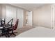 Well lit bedroom featuring a desk, gaming chair, and a closet with sliding doors at 3929 Reyes Ave, Las Vegas, NV 89141