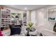 This walk-in closet provides ample storage with custom shelving, hanging racks, and a plush seating area at 3929 Reyes Ave, Las Vegas, NV 89141