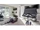 State-of-the-art home gym featuring mirrored walls, sleek equipment, and functional layout ideal for fitness enthusiasts at 3929 Reyes Ave, Las Vegas, NV 89141