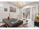 Bright home office with stylish decor, elegant accents, and easy access to the staircase, offering a productive workspace at 3929 Reyes Ave, Las Vegas, NV 89141