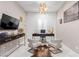 Modern home office with sleek furniture, elegant decor, and ample light creating a sophisticated workspace at 3929 Reyes Ave, Las Vegas, NV 89141