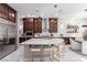 Spacious kitchen features a large center island with seating, stainless steel appliances, and ample cabinet space at 3929 Reyes Ave, Las Vegas, NV 89141