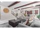 Spacious living room featuring an open layout, a staircase, and a view of the kitchen at 3929 Reyes Ave, Las Vegas, NV 89141