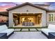 Spacious outdoor patio with comfortable seating, elegant dining area, and seamless indoor-outdoor living at 3929 Reyes Ave, Las Vegas, NV 89141