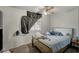 Bedroom with hardwood flooring, hanging curtain and window at 4 Britz Cir, North Las Vegas, NV 89030