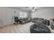 Bright and airy living room featuring tile flooring, comfortable couches, and neutral wall colors at 4 Britz Cir, North Las Vegas, NV 89030