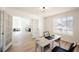 Bright office space with French doors and view to dining room at 4016 Tyler William Ln, Las Vegas, NV 89130