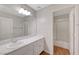 Bathroom featuring a large vanity with marble countertops and a shower-tub combo at 4197 Bottiglia Ave, Las Vegas, NV 89141
