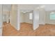 Spacious room with ceiling fan and laminate wood floors at 4197 Bottiglia Ave, Las Vegas, NV 89141