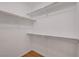 Walk-in closet with built-in shelving providing ample storage at 4197 Bottiglia Ave, Las Vegas, NV 89141