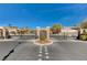 Gated entrance to Bella Vicenza features meticulously maintained landscaping at 4197 Bottiglia Ave, Las Vegas, NV 89141