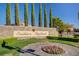 Southern Highlands community sign is set among lush landscaping at 4197 Bottiglia Ave, Las Vegas, NV 89141