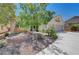 Charming one-story home with a two-car garage, desert landscaping, and a spacious driveway at 4197 Bottiglia Ave, Las Vegas, NV 89141