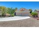 Charming home with a two-car garage and well-maintained desert landscaping at 4197 Bottiglia Ave, Las Vegas, NV 89141