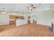 Open floor plan with living room and kitchen; abundant lighting; great space for gathering at 4197 Bottiglia Ave, Las Vegas, NV 89141