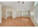 Spacious living room showcasing light floors, arched doorways, and natural light at 4197 Bottiglia Ave, Las Vegas, NV 89141