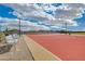 Outdoor basketball court featuring benches, lights and mature landscaping at 4519 Sapphire Moon Ave, North Las Vegas, NV 89084