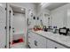 Bathroom features a granite countertop, modern fixtures, and white subway tile in shower at 4519 Sapphire Moon Ave, North Las Vegas, NV 89084