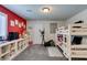 ' bedroom features bunk beds, entertainment center, and an exercise machine at 4519 Sapphire Moon Ave, North Las Vegas, NV 89084