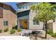Charming two-story home with a welcoming yellow front door and well-maintained landscaping at 4519 Sapphire Moon Ave, North Las Vegas, NV 89084