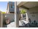 Private patio area with stone pavers, modern decor, and view of gate to walking path at 4519 Sapphire Moon Ave, North Las Vegas, NV 89084