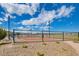 Community pickleball court with green fencing and mountain views in the background at 4519 Sapphire Moon Ave, North Las Vegas, NV 89084