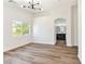 Spacious bedroom with wood-look floors and ensuite bath featuring double sinks at 4779 Straight Flush Dr # 103, Las Vegas, NV 89122