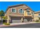 Beautiful two-story home with a two-car garage, stucco exterior, and private balcony in a well-kept neighborhood at 4779 Straight Flush Dr # 103, Las Vegas, NV 89122