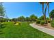 Well-maintained community park with splash pad, mature trees, and walkways for residents at 4779 Straight Flush Dr # 103, Las Vegas, NV 89122