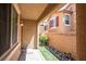 Cozy covered patio with view of adjacent building at 4786 Castel Martini Ct, Las Vegas, NV 89147