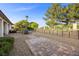 Private backyard featuring a paved patio with outdoor seating and a charming fire pit at 5020 Linkside Dr, Las Vegas, NV 89130