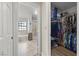 En-suite bathroom view with shower, bathtub, and direct access to a walk-in closet at 5020 Linkside Dr, Las Vegas, NV 89130