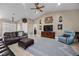 A comfortable living room with tile floors and vaulted ceilings, ideal for relaxation at 5020 Linkside Dr, Las Vegas, NV 89130