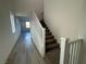Hallway with plush carpeted stairs and hardwood floors at 5163 Capucina St # Lot 3, Las Vegas, NV 89122