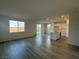 Open-concept living room with hardwood floors and plenty of natural light at 5163 Capucina St # Lot 3, Las Vegas, NV 89122