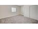 Bright bedroom with white shuttered window and spacious closet at 5500 Santovito St, Pahrump, NV 89061