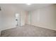 Inviting carpeted bedroom with ensuite bathroom access and ample space at 5500 Santovito St, Pahrump, NV 89061