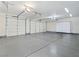 Large garage with ample parking space and additional storage cabinets at 5500 Santovito St, Pahrump, NV 89061