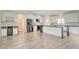 Modern kitchen with stainless steel appliances and large island at 5500 Santovito St, Pahrump, NV 89061